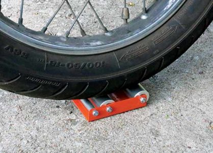 Keeping a Wheel Up: Wheel Jockey Image